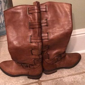 brown leather boots with buckles